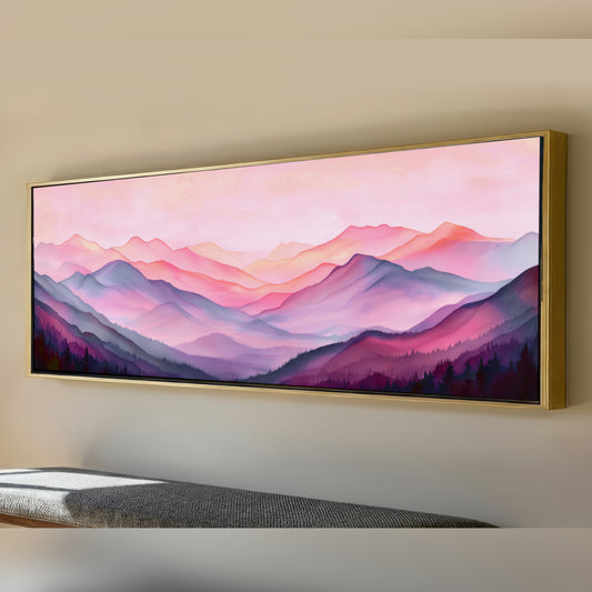 a large, framed painting of a mountainous landscape with a vibrant, colorful sky.