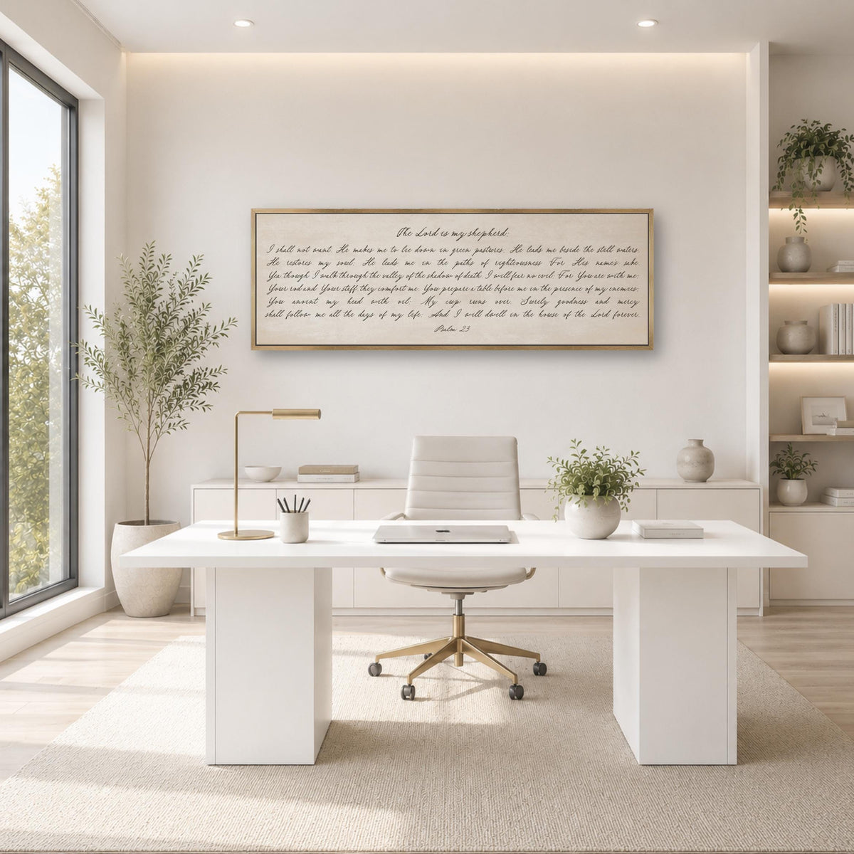 a modern, minimalist office space with a large window, white desk, and a framed text on the wall.