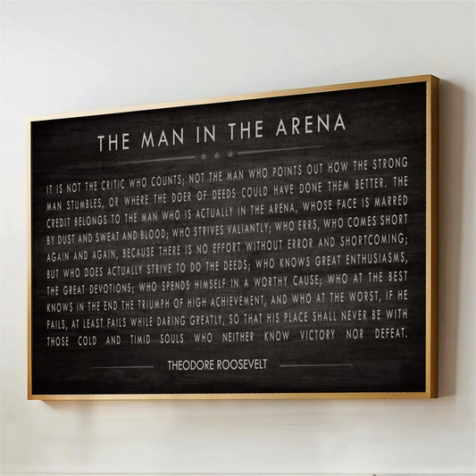 a framed quote by Theodore Roosevelt, which is a famous piece of literature and a well-known American author.