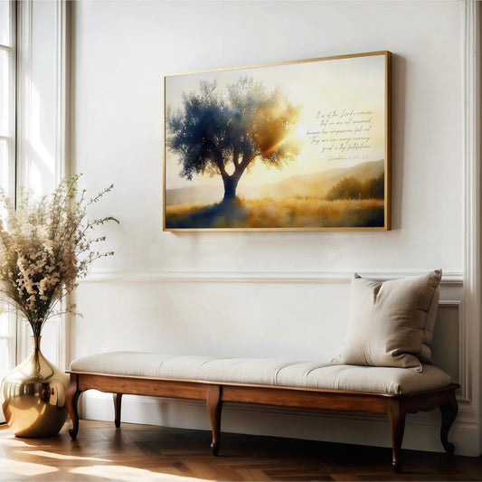 a serene indoor setting with a large painting of a tree on the wall, a wooden bench with a beige cushion, and a vase of flowers on the floor.
