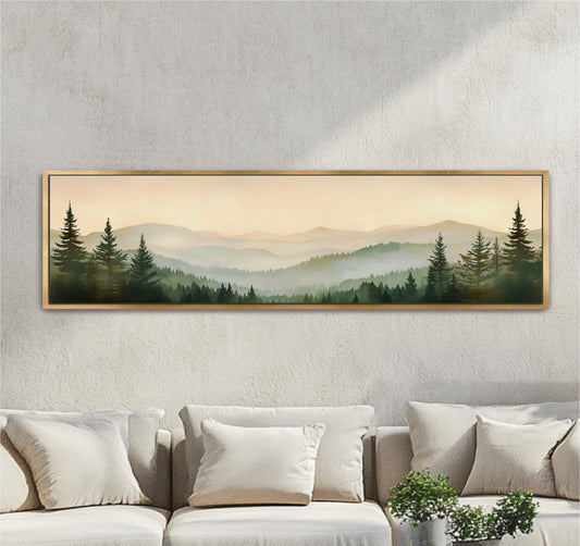 a large framed landscape painting hanging on a wall above a couch with white pillows.