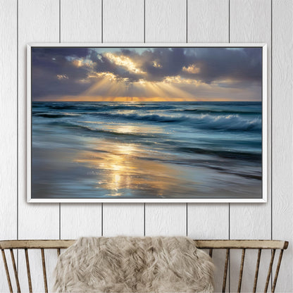 A framed painting depicting a serene beach scene with waves crashing against the shore, the sun setting in the distance, and the sky filled with clouds and sunbeams.