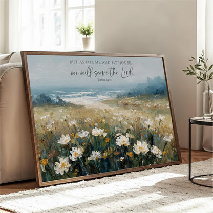 A framed painting depicting a field of white flowers with a blue sky and ocean in the background, accompanied by a Bible verse.