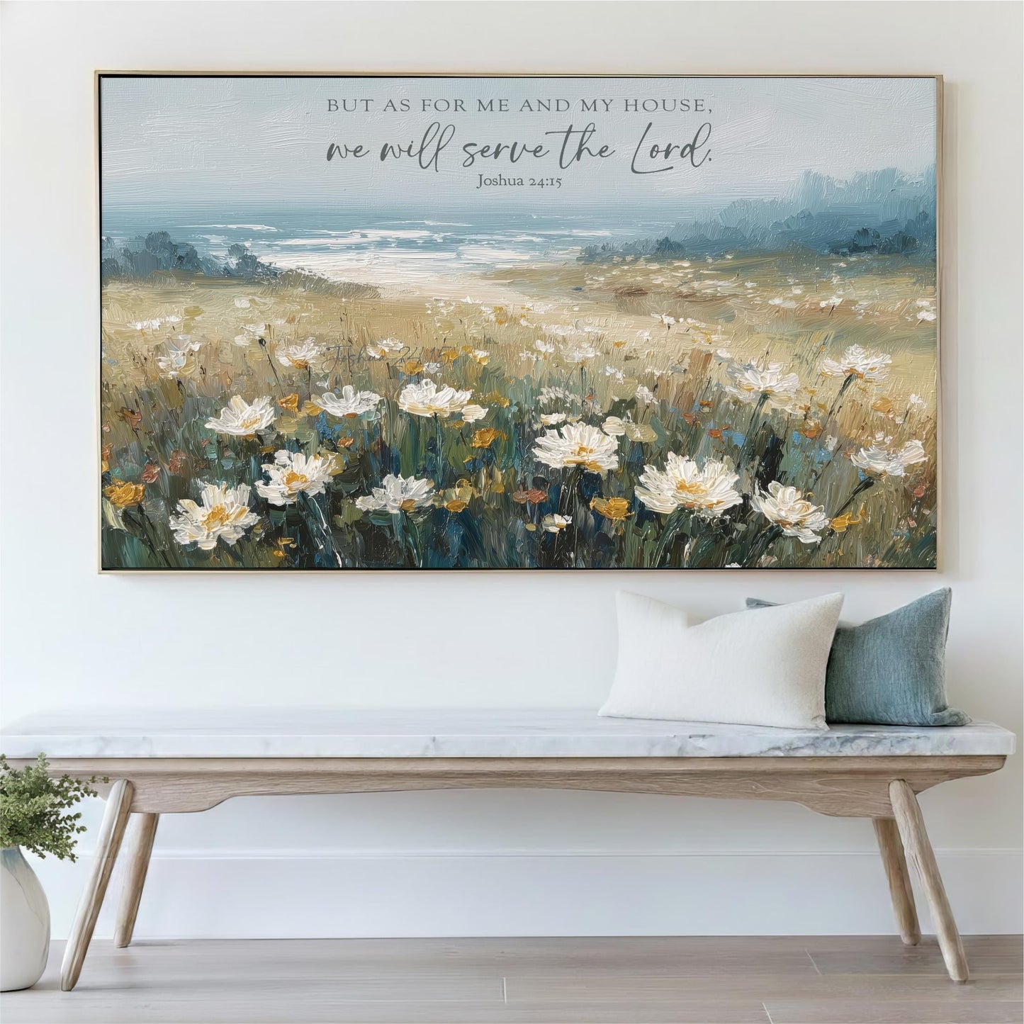 a large painting of a field of flowers hanging on a wall above a wooden bench.