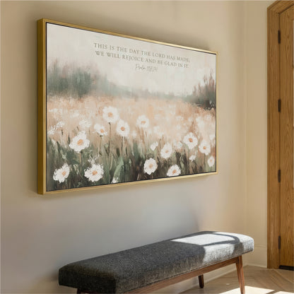 a large framed painting of a field of white flowers hanging on a wall.