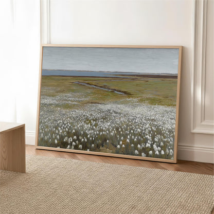 a large painting of a field with white flowers, displayed on a wall in a room.