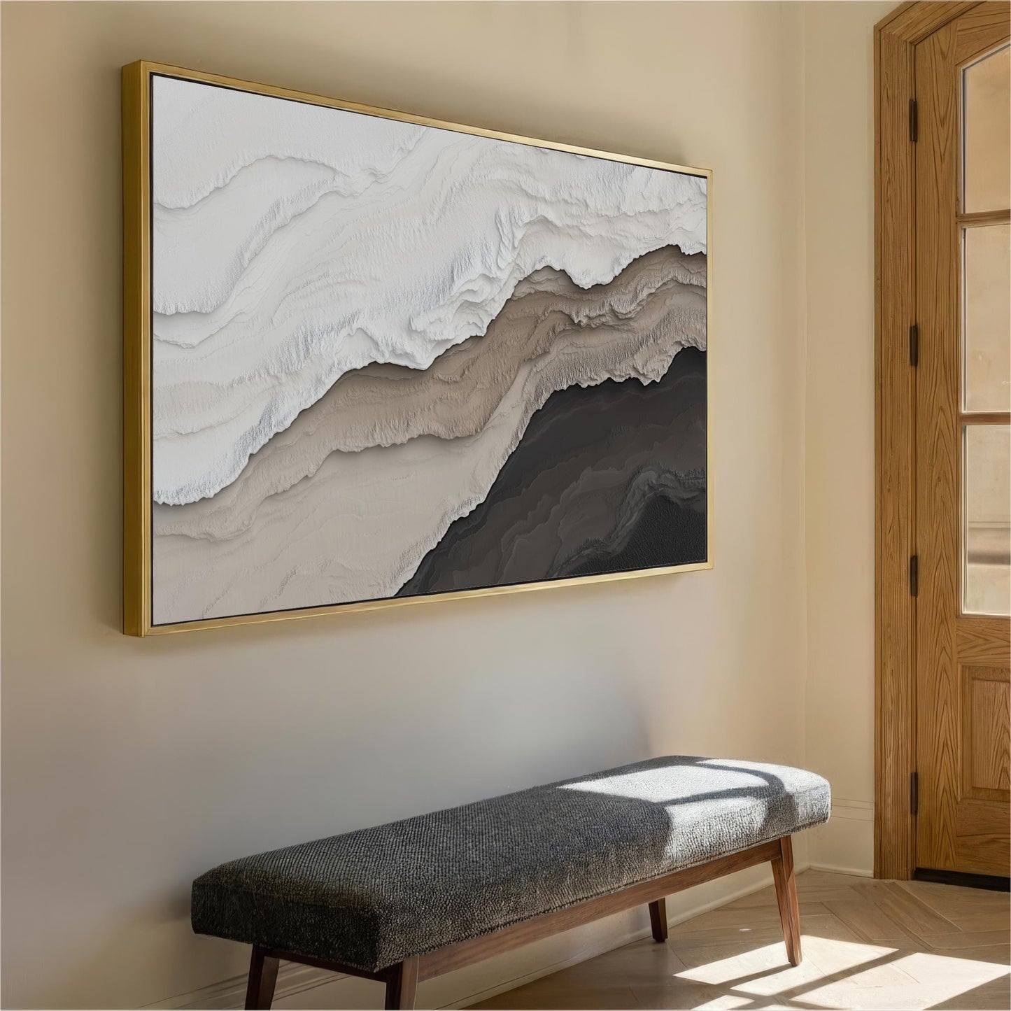a large abstract painting hanging on a wall, with a wooden bench placed in front of it.