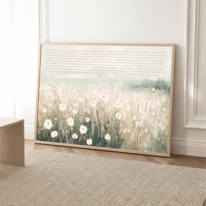 a large framed painting of a field of white flowers on a wooden floor.