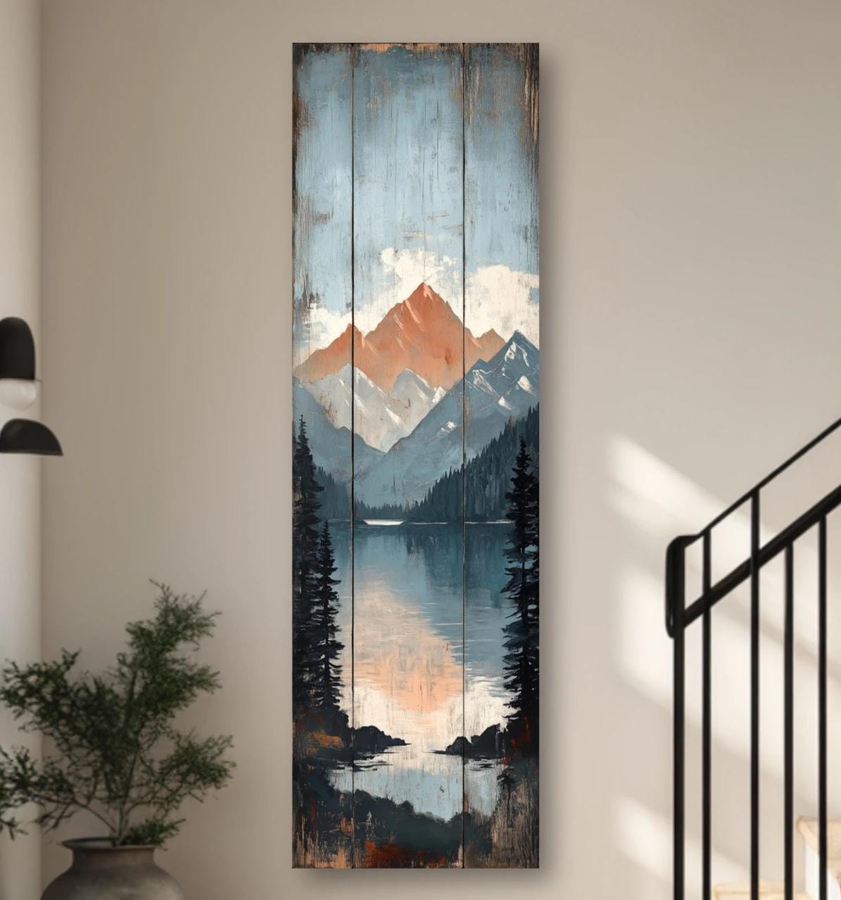 a modern and minimalist interior design, featuring a large painting of a mountain landscape hanging on the wall, a black metal railing on the staircase, and a wooden bench near the staircase.
