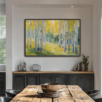 a large painting of a forest scene hanging on a wall above a wooden dining table with black cabinets below it.