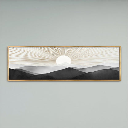 A framed artwork depicting a serene landscape with a sun rising over a mountain range.