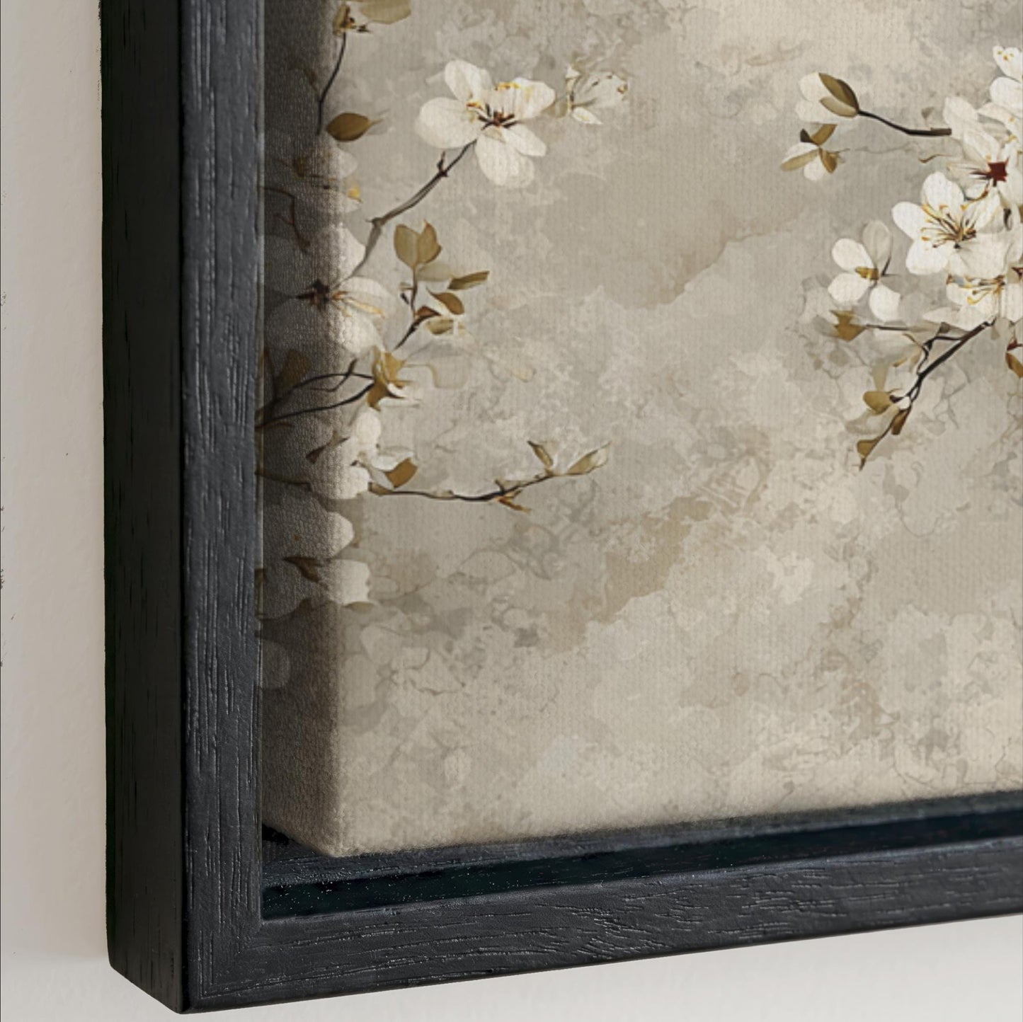a close-up view of a framed painting with a floral design.