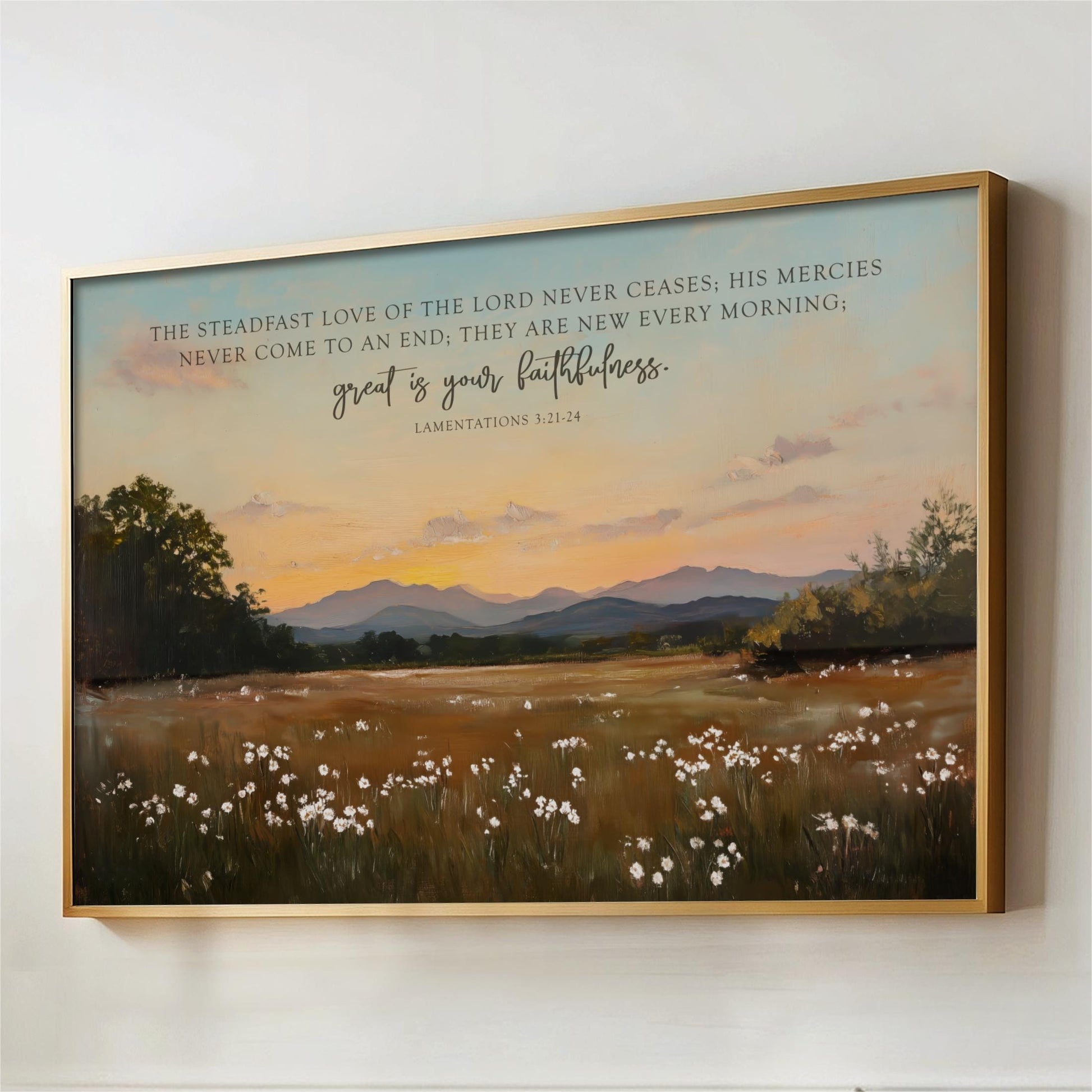 The image is a framed painting depicting a serene landscape with a field of white flowers, mountains in the distance, and a sunset sky. The text overlay provides a biblical message about the steadfast love of the Lord and the mercies that never come to an end, emphasizing the importance of faithfulness.