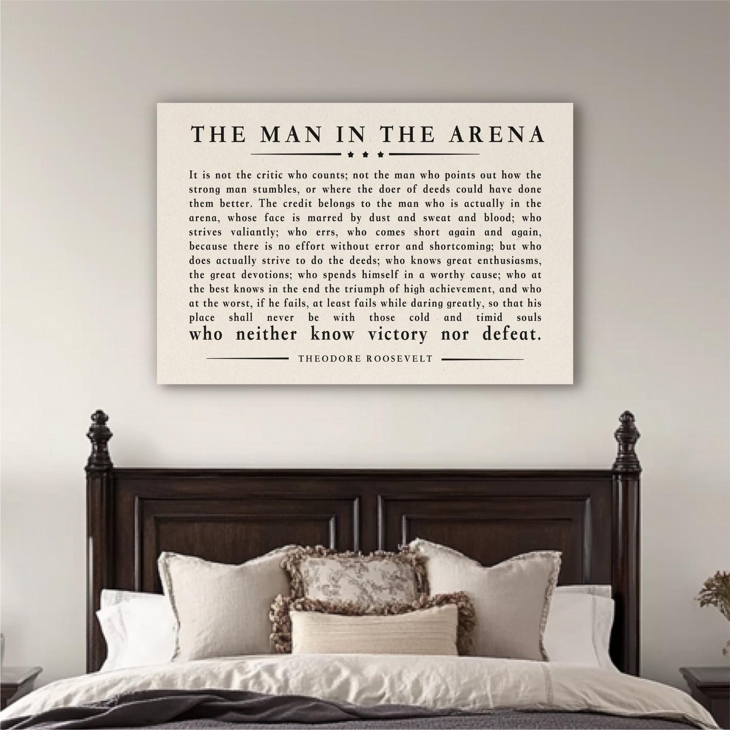 a quote by Theodore Roosevelt, which is a famous speech by the former US President. The quote is displayed on a wall above a bed, creating a visually appealing and thought-provoking composition.