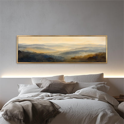 a large, framed landscape painting hanging above a bed with white bedding.