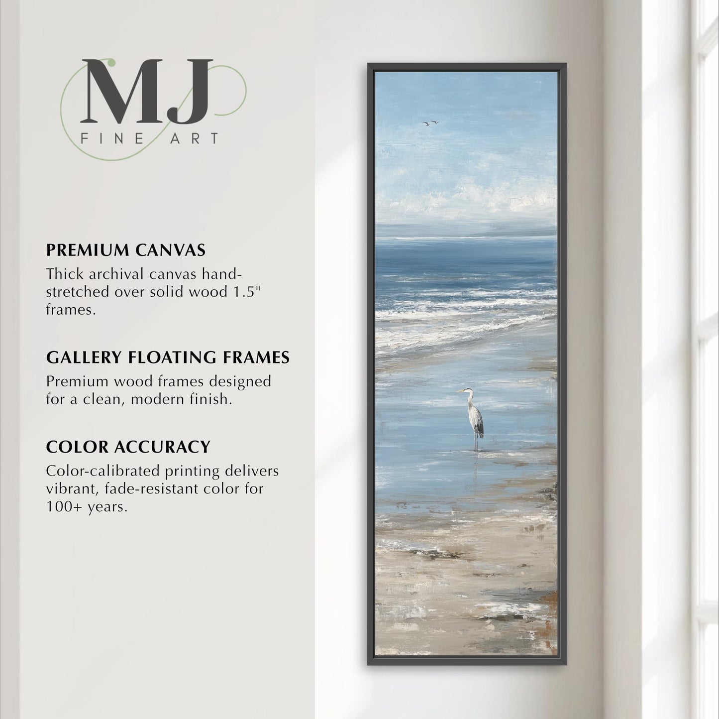 a tall, narrow, and thin framed painting of a seagull standing on the beach, with the ocean in the background. The painting is a gallery floating frame, which is a type of frame designed for modern art and photography. The frame is made of premium wood and has a clean, modern finish. The painting is color accurate, which means the colors in the painting are true to the original colors, and the color-calibrated printing delivers vibrant, fade-resistant color for 100 years.