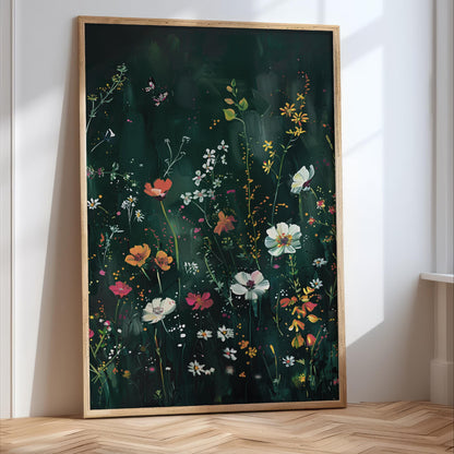 a large, framed painting of a vibrant floral scene with various types of flowers and plants.
