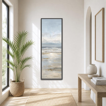 a serene and modern living room with a large window, a wooden table, a potted plant, and a framed painting of a beach scene.