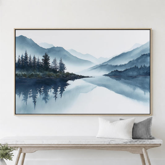 a large framed painting of a serene landscape with a lake, mountains, and pine trees. The painting is hung on a wall above a wooden bench, which has two pillows on it.