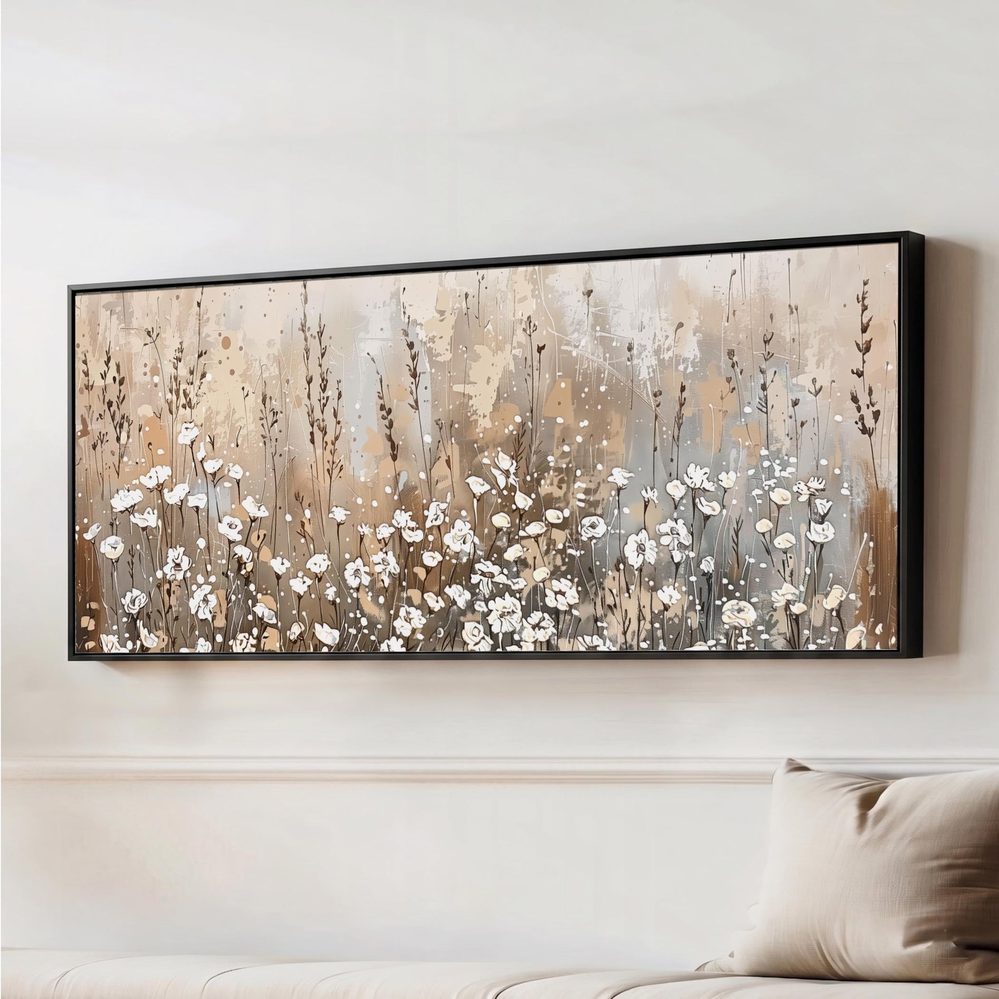 a large painting of a field of flowers hanging on a wall.