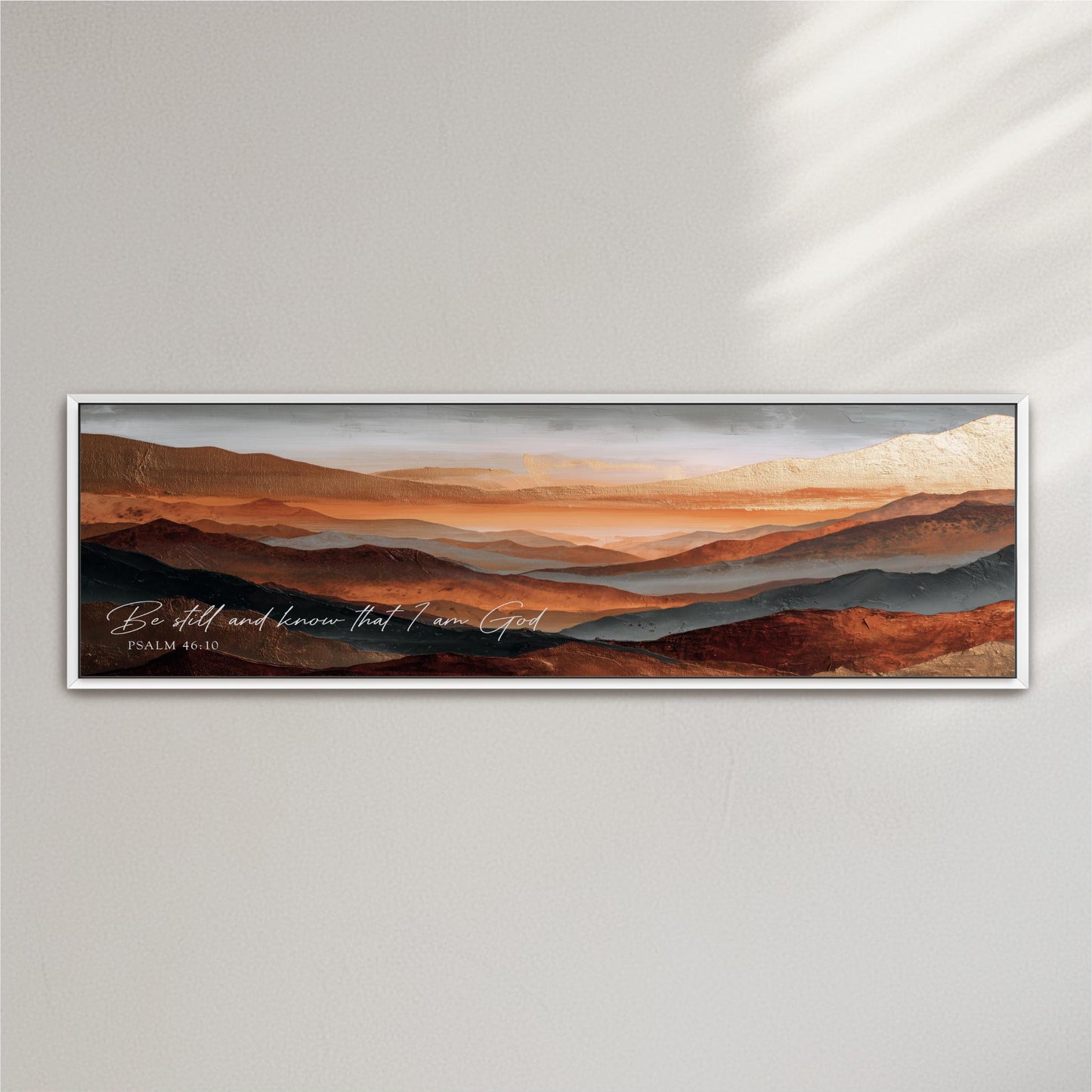 The image is a framed painting depicting a scenic landscape with mountains and a sunset sky.