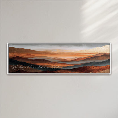 The image is a framed painting depicting a scenic landscape with mountains and a sunset sky.