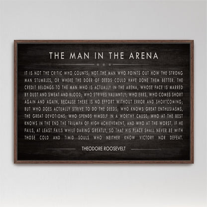 a quote by Theodore Roosevelt, a famous American author and President, displayed in a black and white framed print.