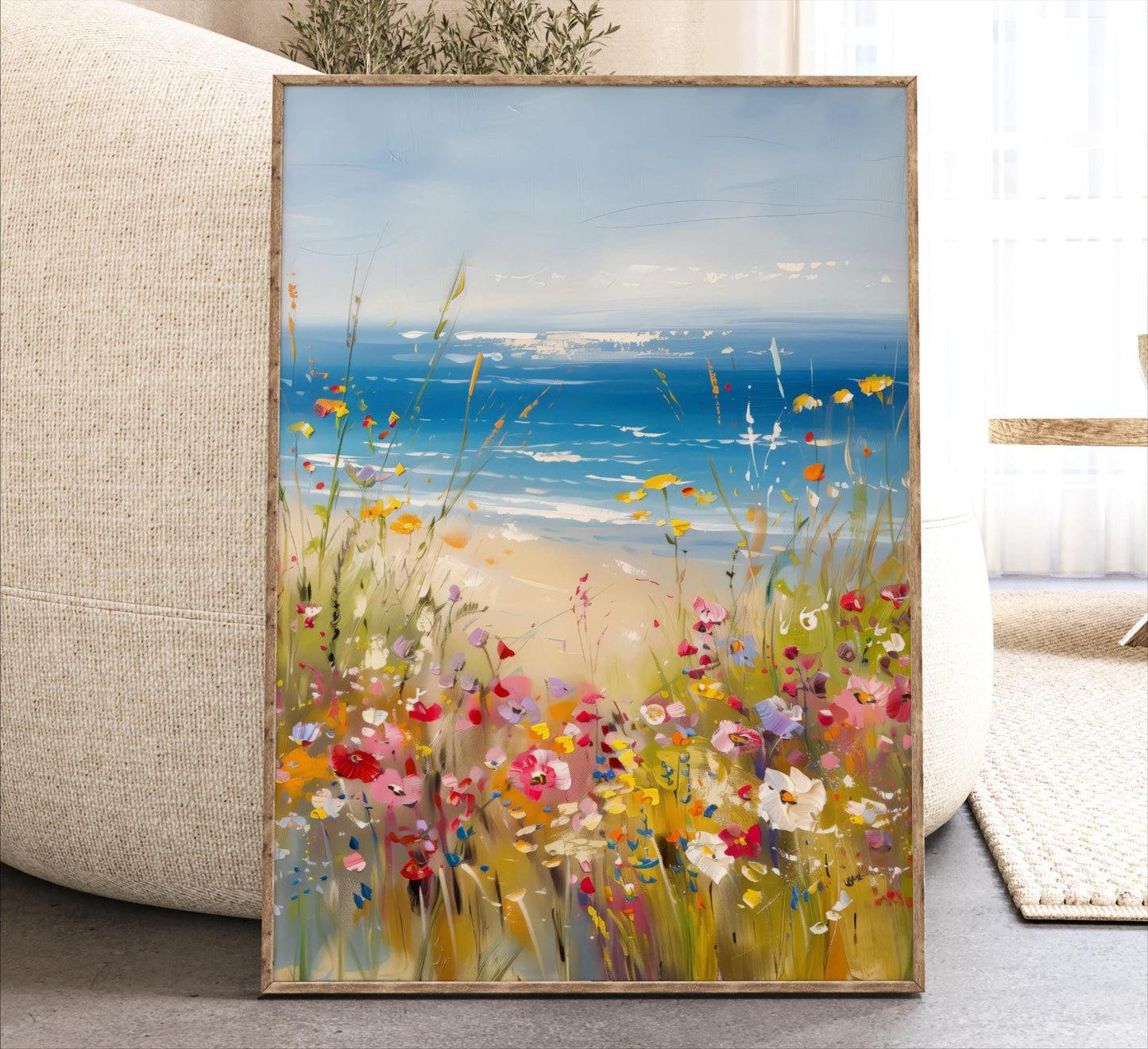 a vibrant painting of a field of colorful flowers, with the ocean visible in the background.