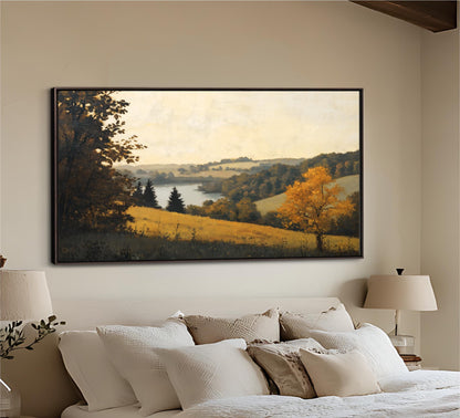 a large landscape painting hanging on a wall above a bed with white bedding.