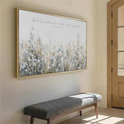 a large framed painting of a field of flowers hanging on a wall, with a gray bench below it.