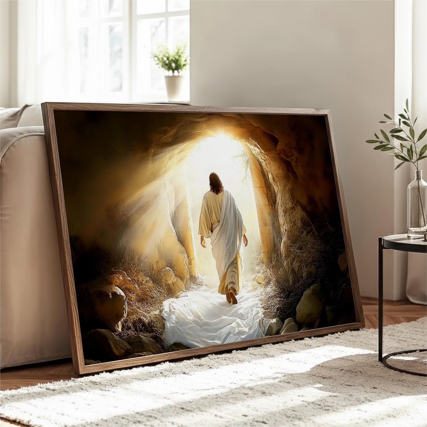 A framed print depicting a person in a white robe walking through a tunnel with sunlight shining through, creating a sense of hope and guidance.