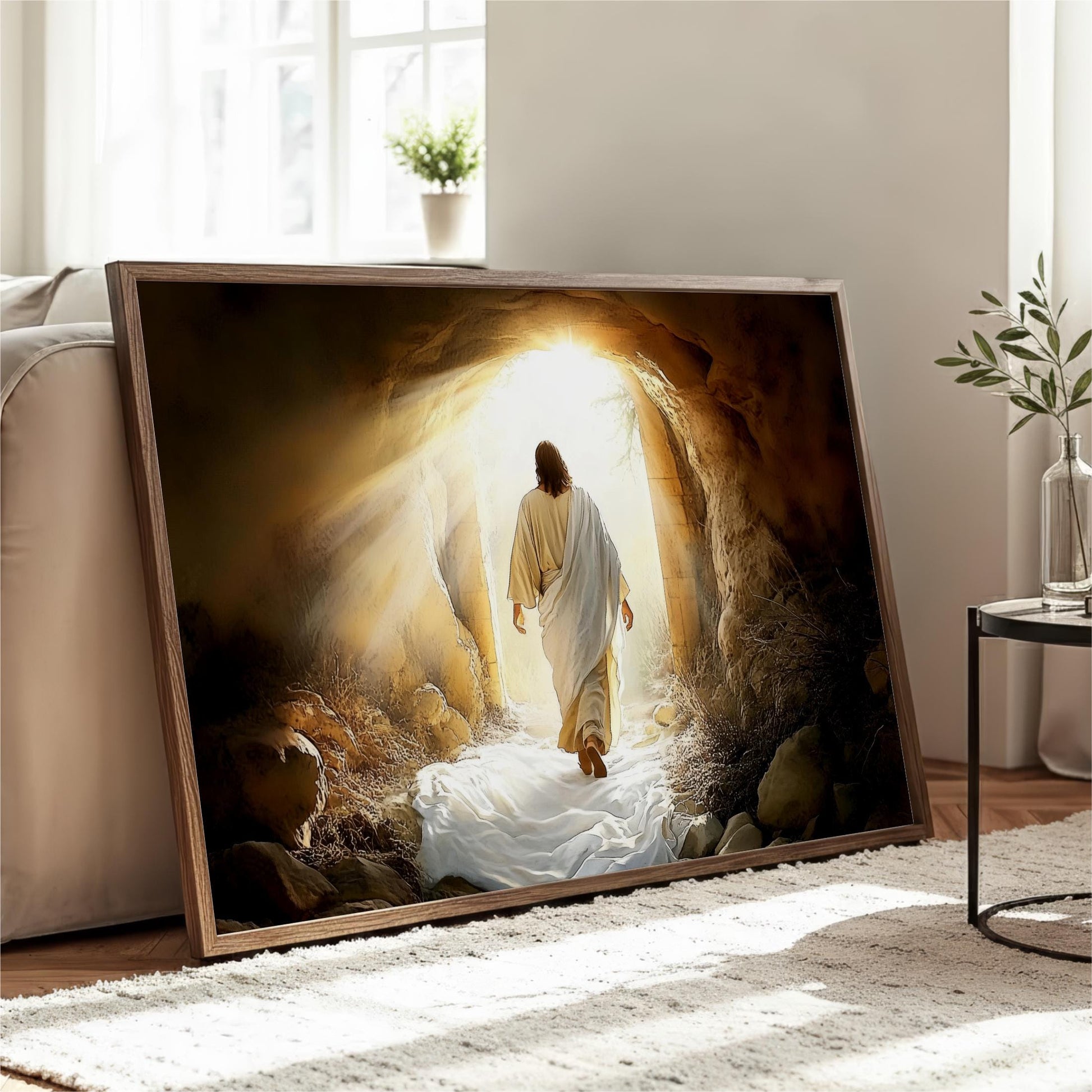 A framed print depicting a person in a white robe walking through a tunnel with sunlight shining through, creating a sense of hope and guidance.