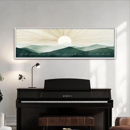 a black piano with a framed landscape painting above it, depicting a sun rising over a mountainous terrain.
