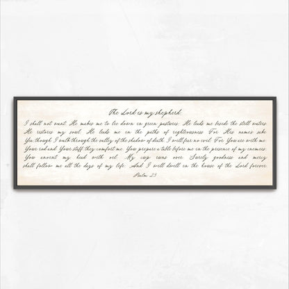 a framed print of a handwritten Bible verse, specifically Psalm 23, which is a passage from the Bible.