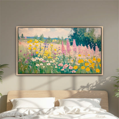 a large, colorful painting of a field of flowers hanging on a wall above a bed.