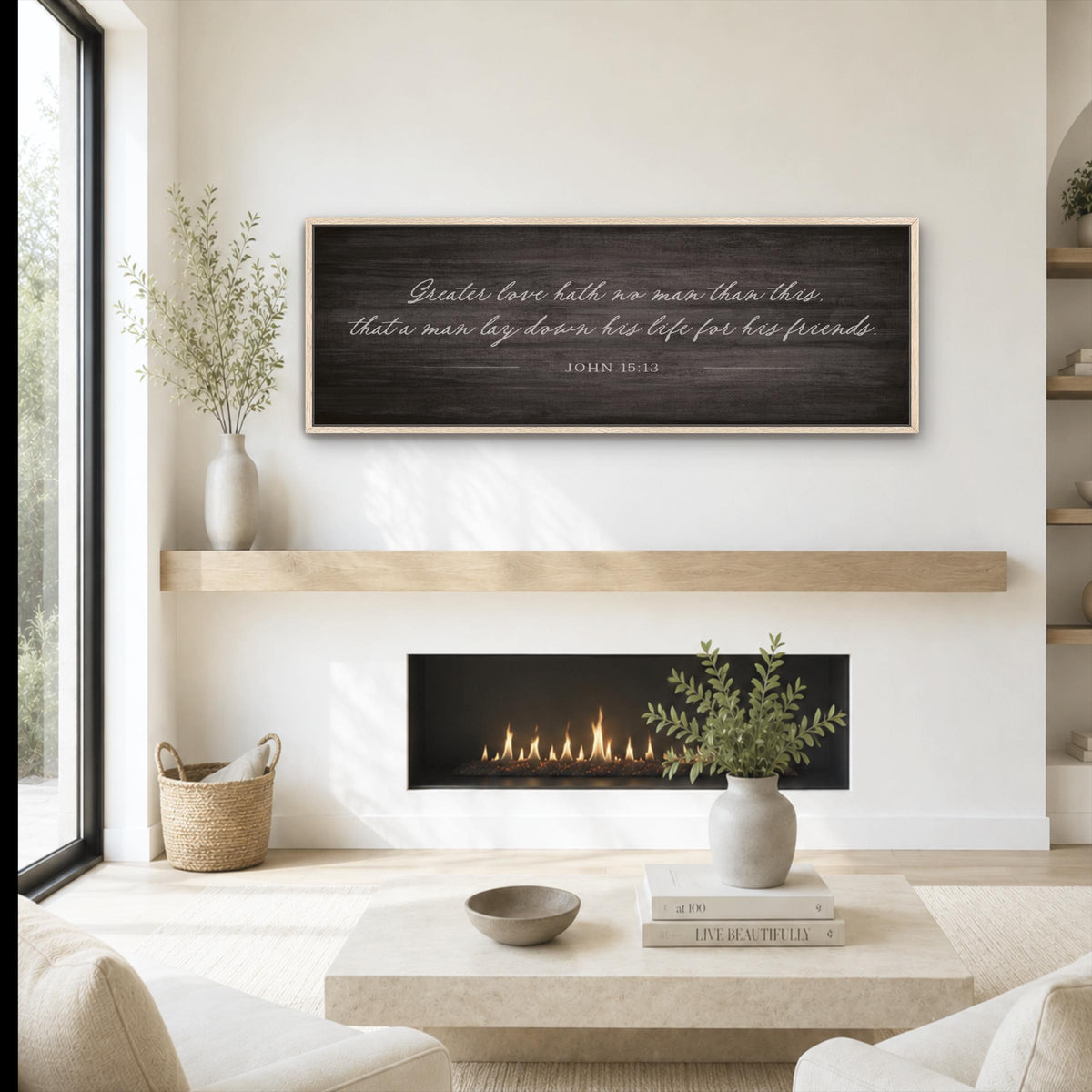 A cozy living room with a fireplace, a wooden shelf, and a framed inspirational quote on the wall.