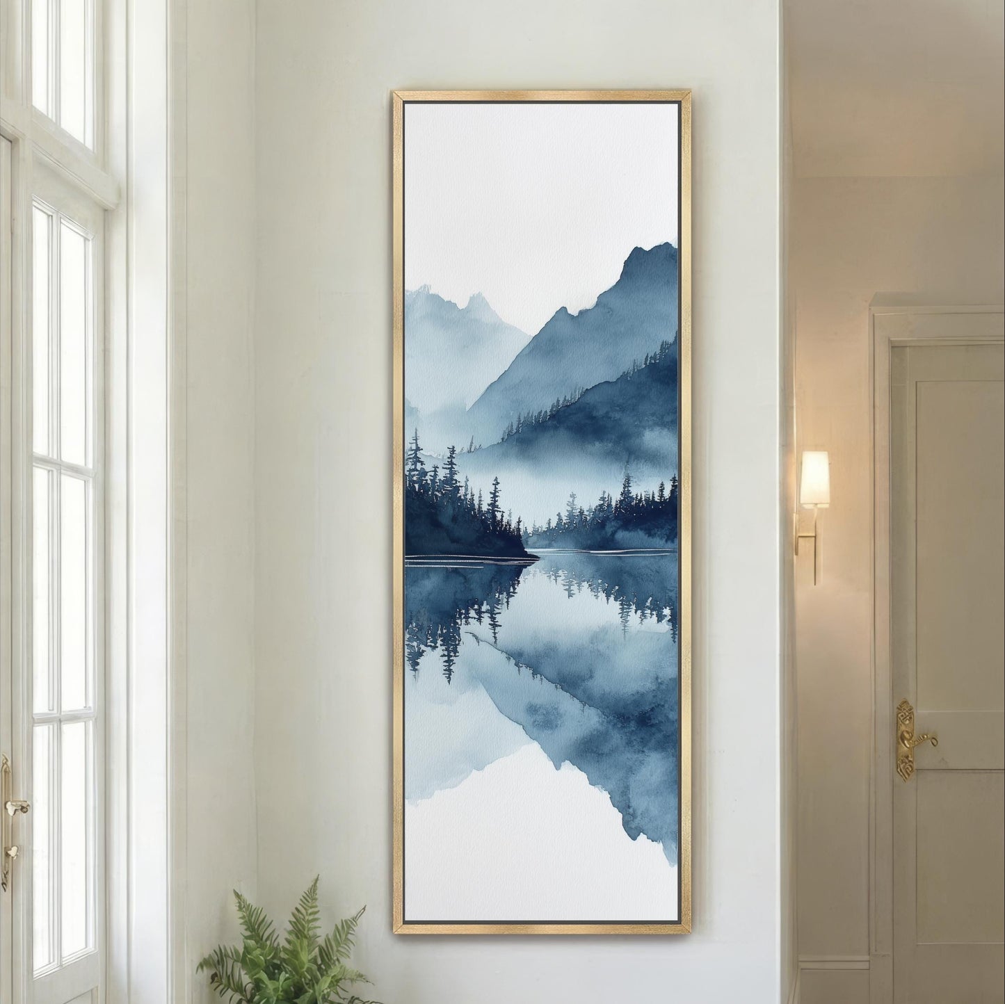 a large framed painting depicting a serene landscape with a lake and mountains in the background, creating a peaceful and tranquil atmosphere.