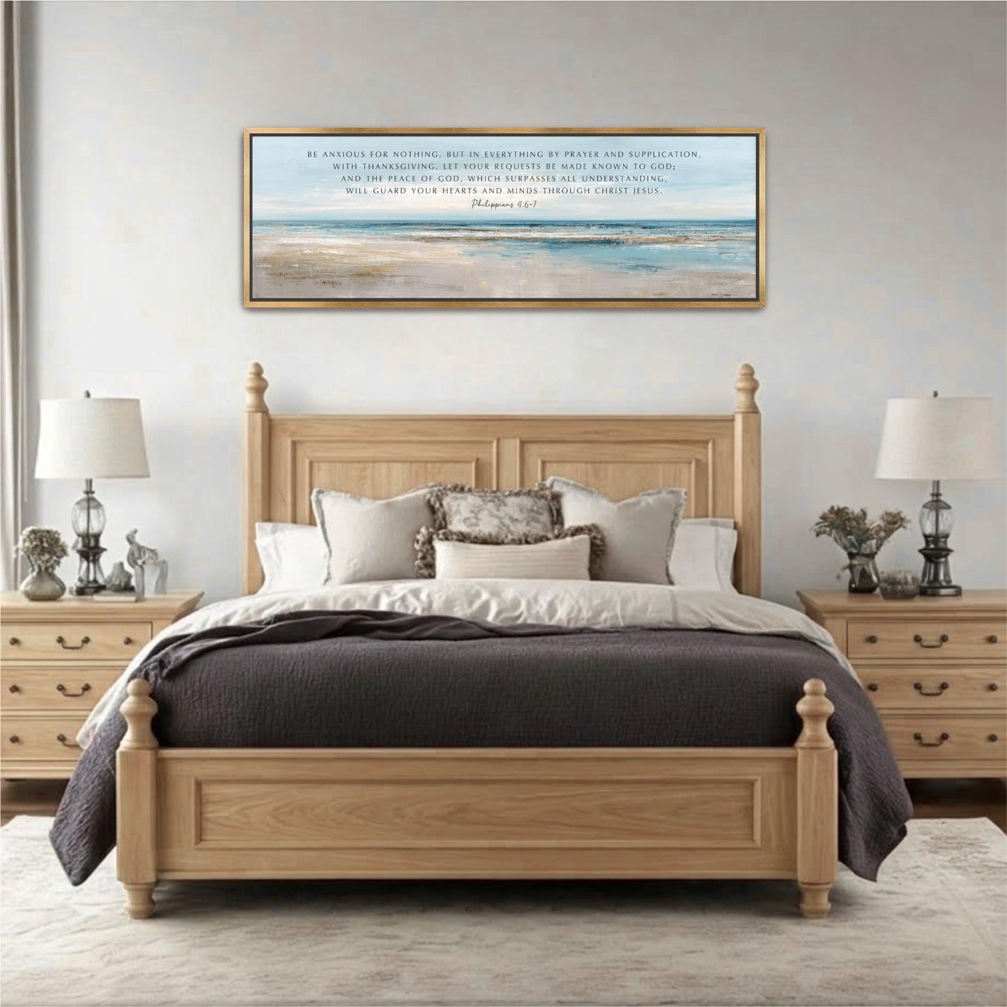 a serene bedroom setting with a large wooden bed, a wooden headboard, and a framed painting above it. The bed is adorned with a gray comforter and white pillows, creating a cozy and inviting atmosphere. The painting, which appears to be a religious or inspirational message, adds a touch of thoughtfulness and tranquility to the room. The overall scene conveys a sense of peace and comfort, with the bed as the focal point of the space.