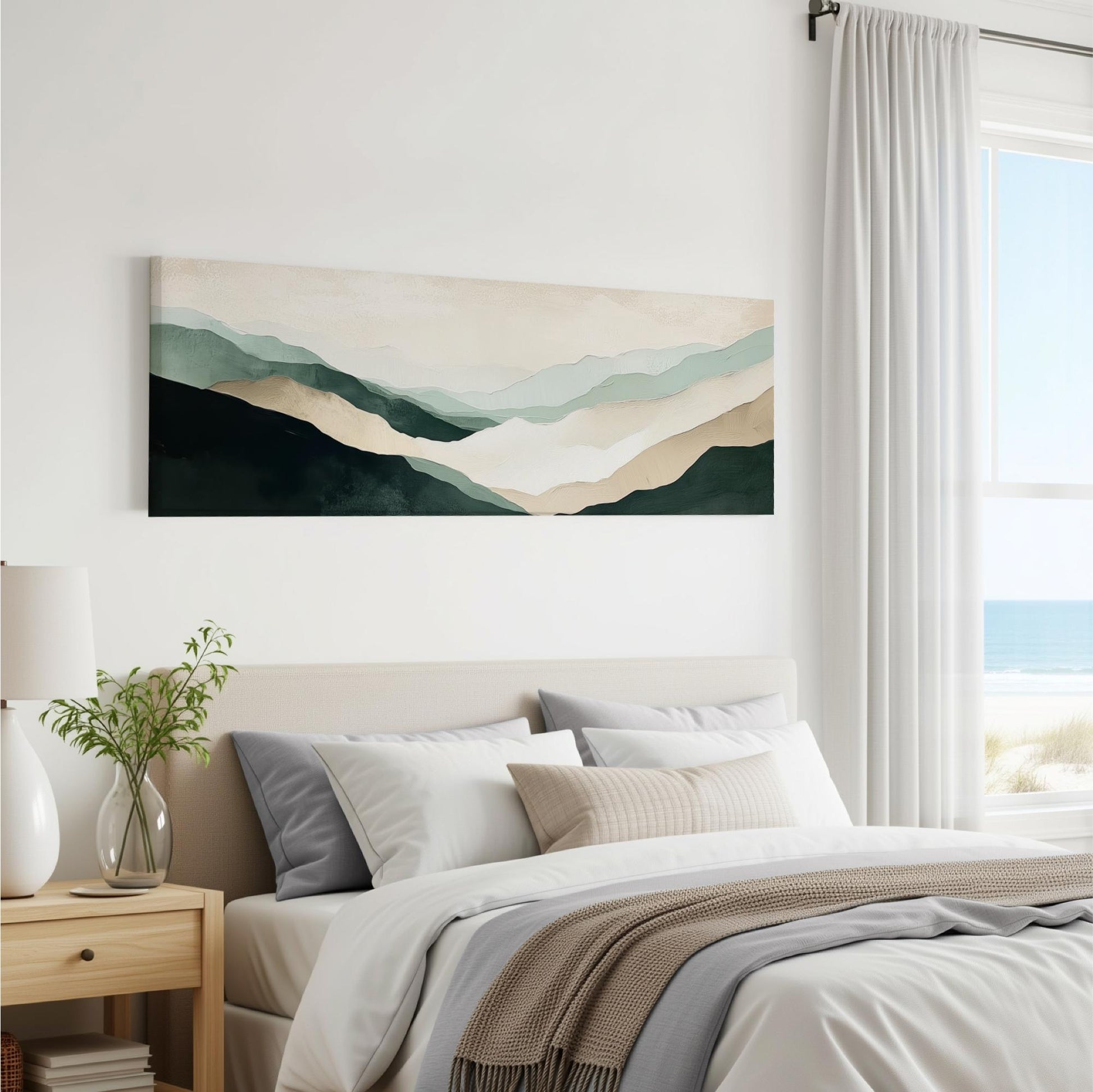a serene bedroom scene with a large bed, a nightstand, and a painting of mountains hanging on the wall.