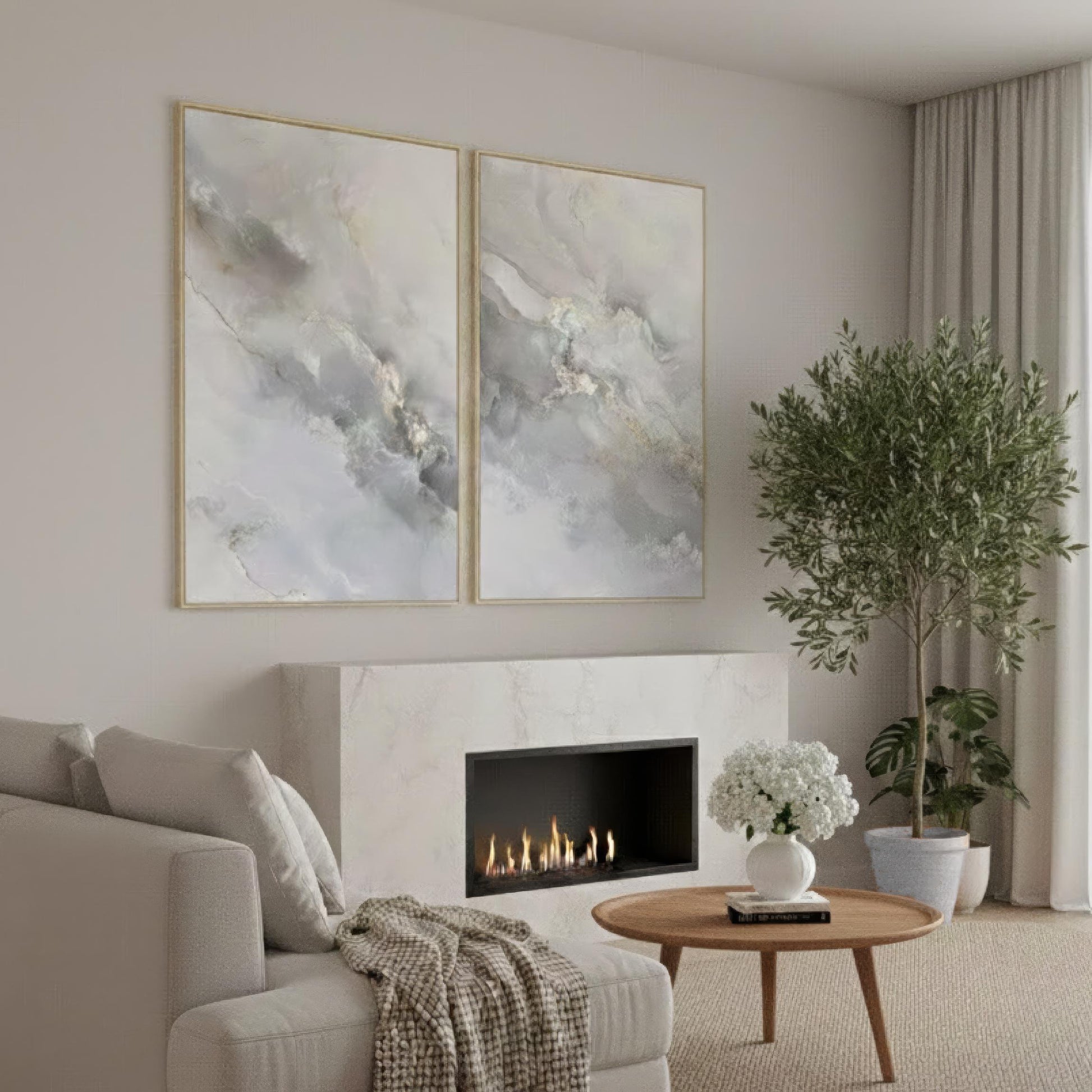 a cozy living room with a fireplace, a comfortable sofa, and a coffee table with a vase of white flowers. The room has a neutral color scheme with gray walls and a white carpet, creating a warm and inviting atmosphere.