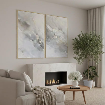 a cozy living room with a fireplace, a comfortable sofa, and a coffee table with a vase of white flowers. The room has a neutral color scheme with gray walls and a white carpet, creating a warm and inviting atmosphere.