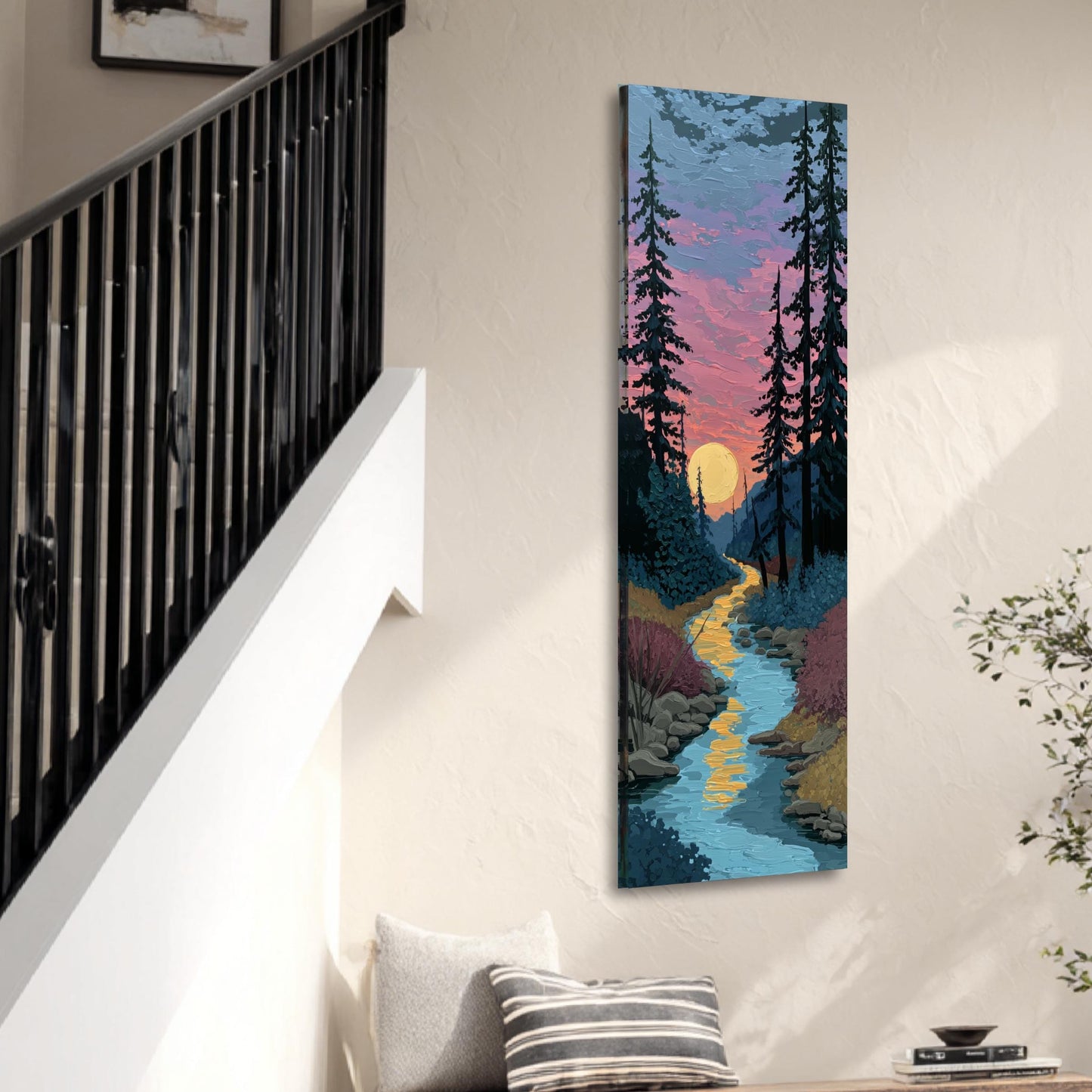 a large vertical painting hanging on a wall, depicting a serene landscape with a winding river and a sunset sky.