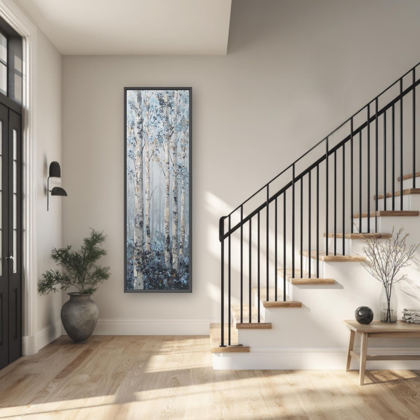 a modern and minimalist interior design, featuring a large painting of trees hanging on the wall, a black metal railing on the staircase, a wooden bench, and a potted plant.