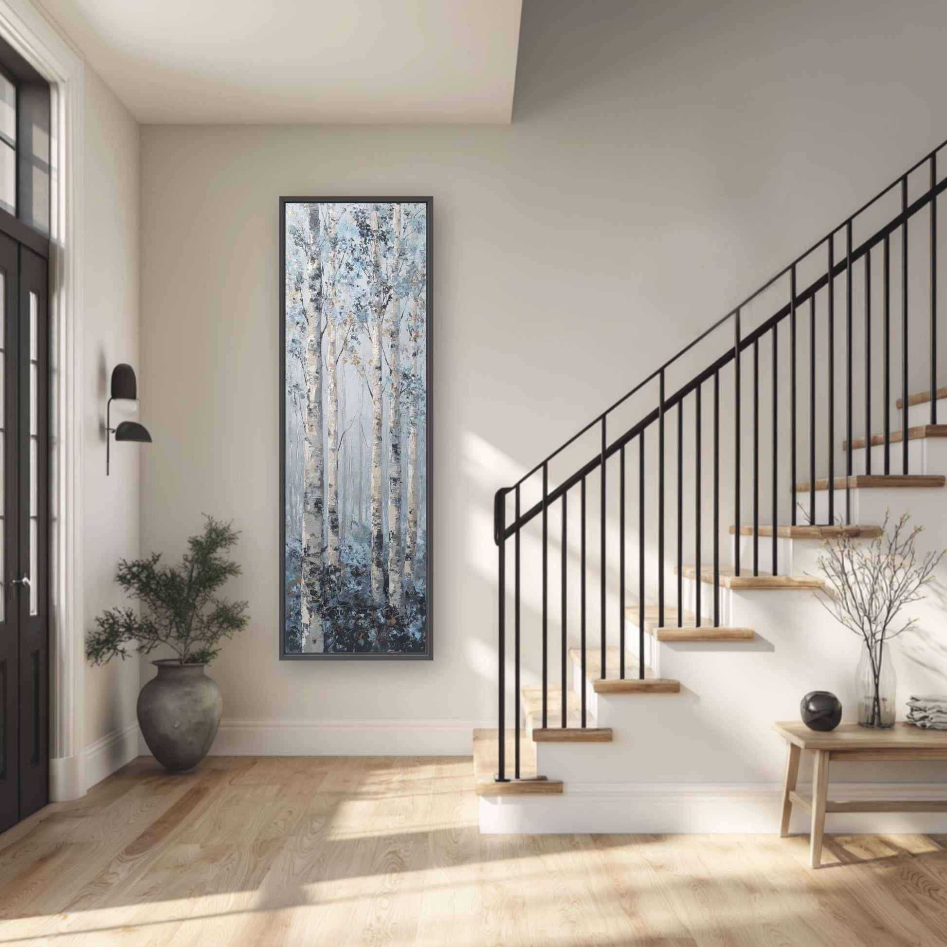a modern and minimalist interior design, featuring a large painting of trees hanging on the wall, a black metal railing on the staircase, a wooden bench, and a potted plant.