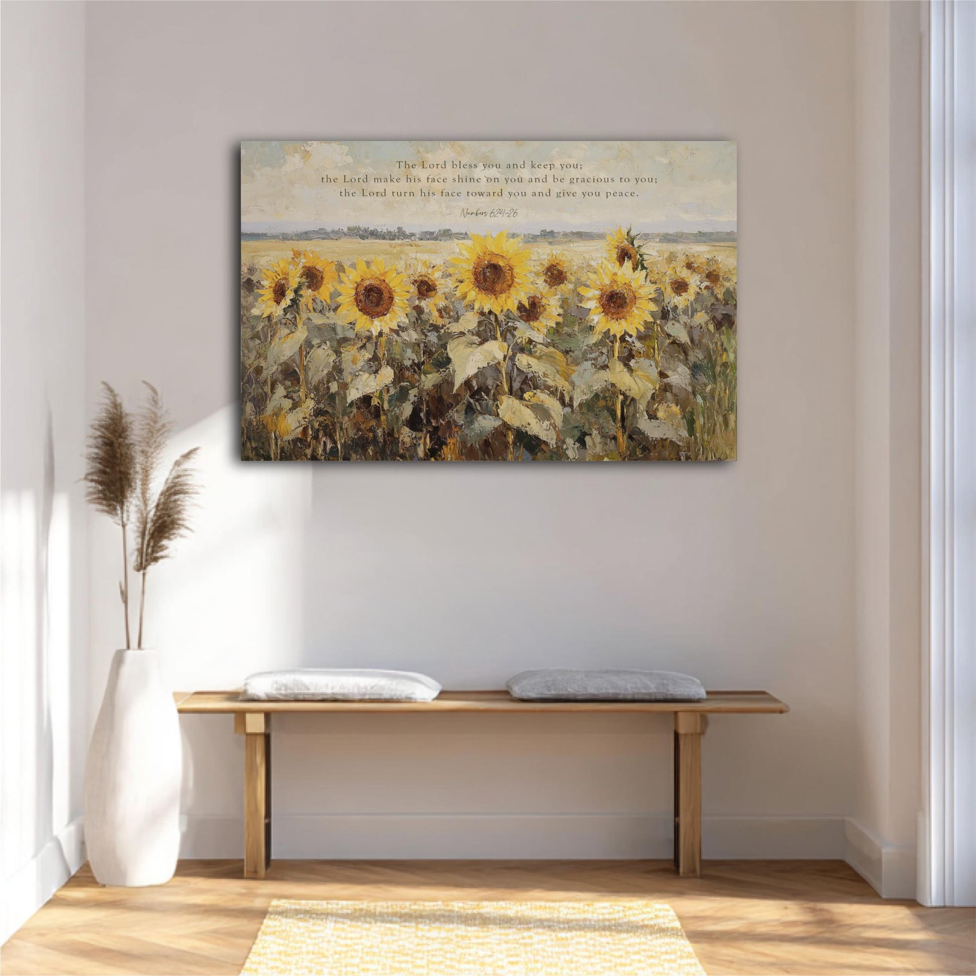a large painting of a field of sunflowers hanging on a wall above a wooden bench.