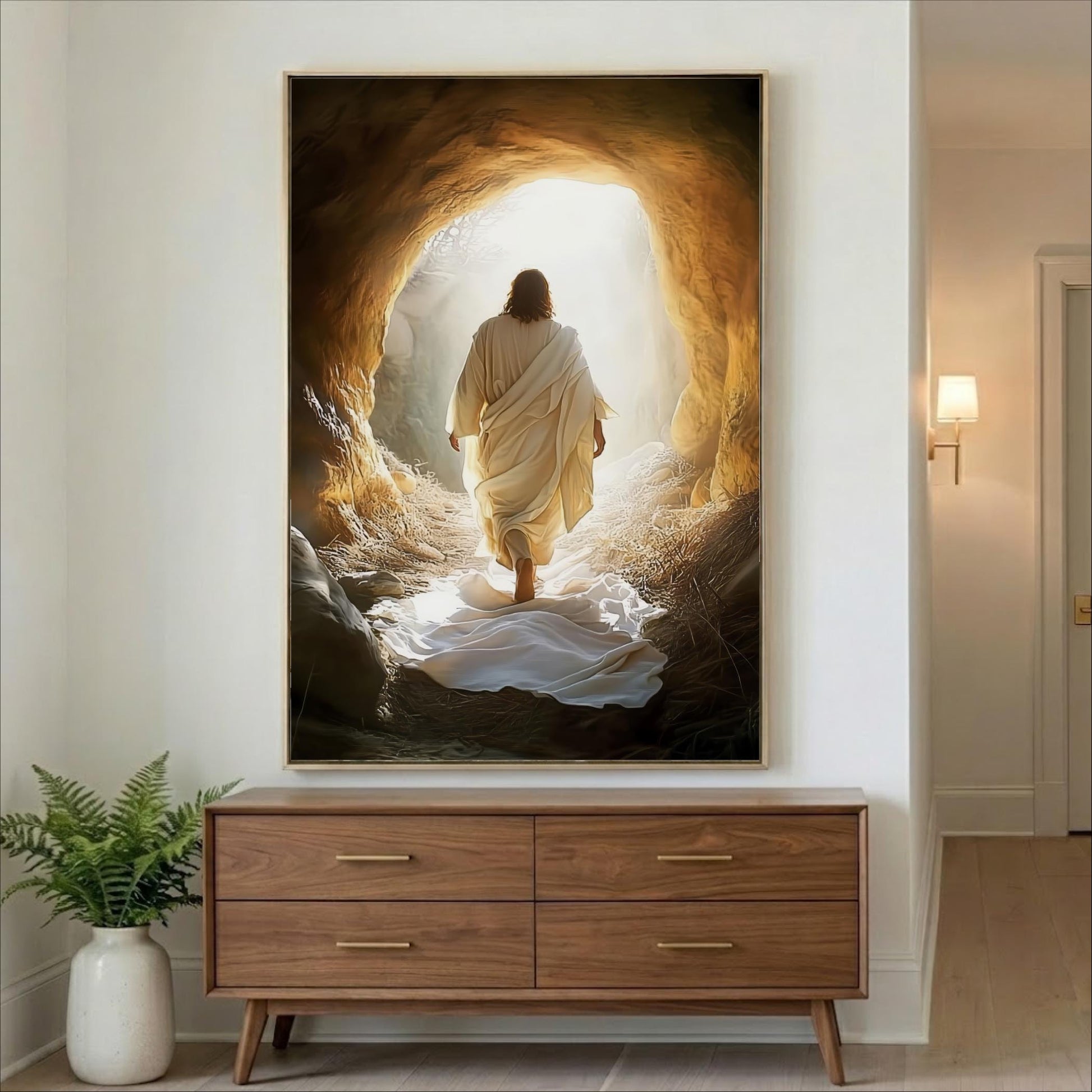 a person in a white robe walking through a cave with a bright light at the end, creating a sense of hope and guidance.