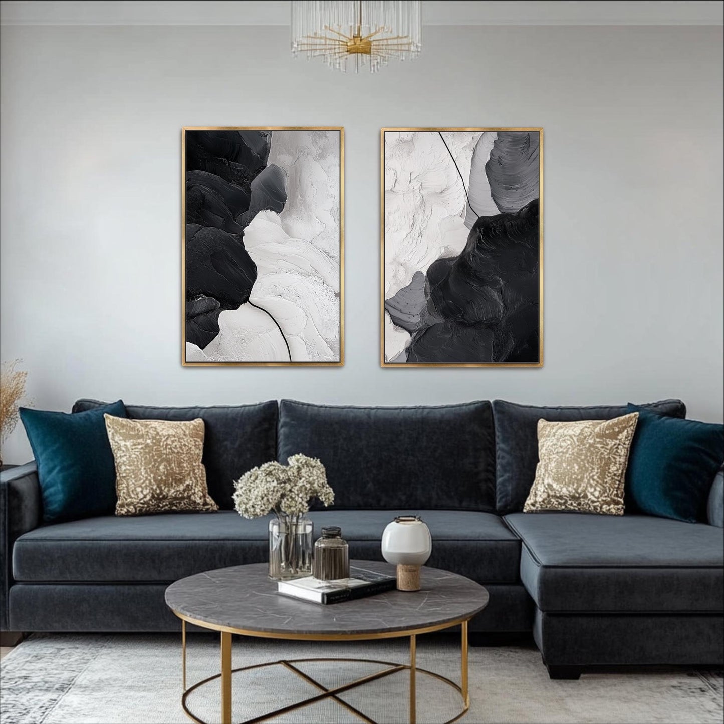 a modern living room with a gray sectional sofa, a round coffee table, and two abstract paintings hanging on the wall above the sofa.