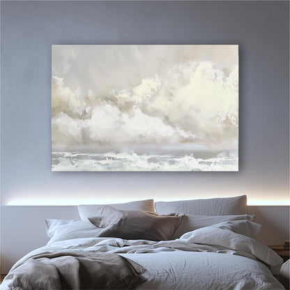 a large painting hanging above a bed in a bedroom