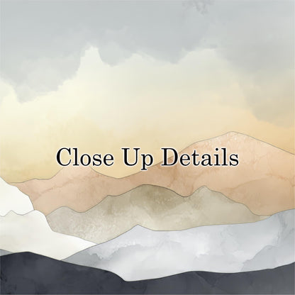 The image is a watercolor painting of mountains with a cloudy sky in the background.