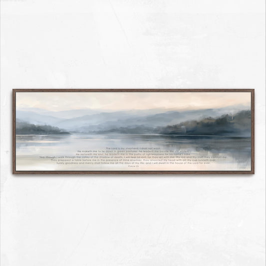 The image is a framed painting depicting a serene landscape with a body of water and mountains in the background.